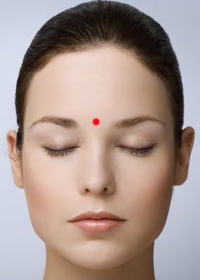 What causes pressure in the forehead area?